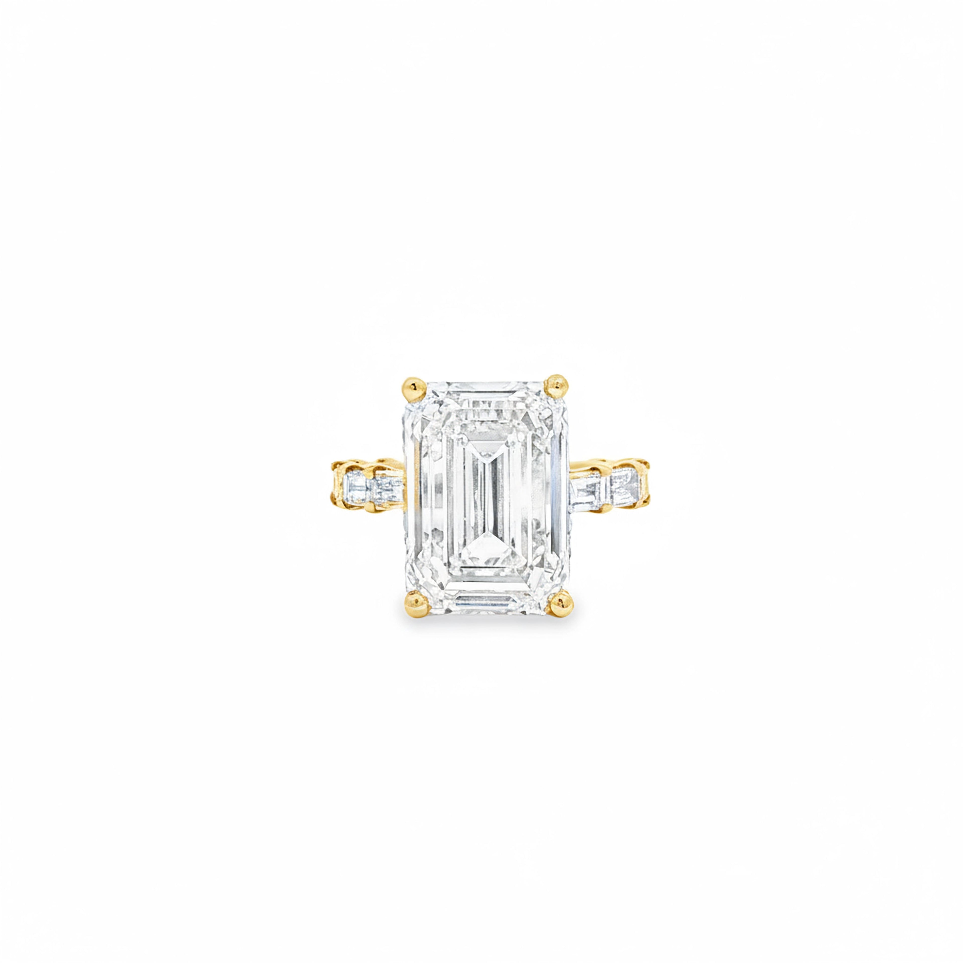 10ct Emerald Ring with Baguette Side Stones