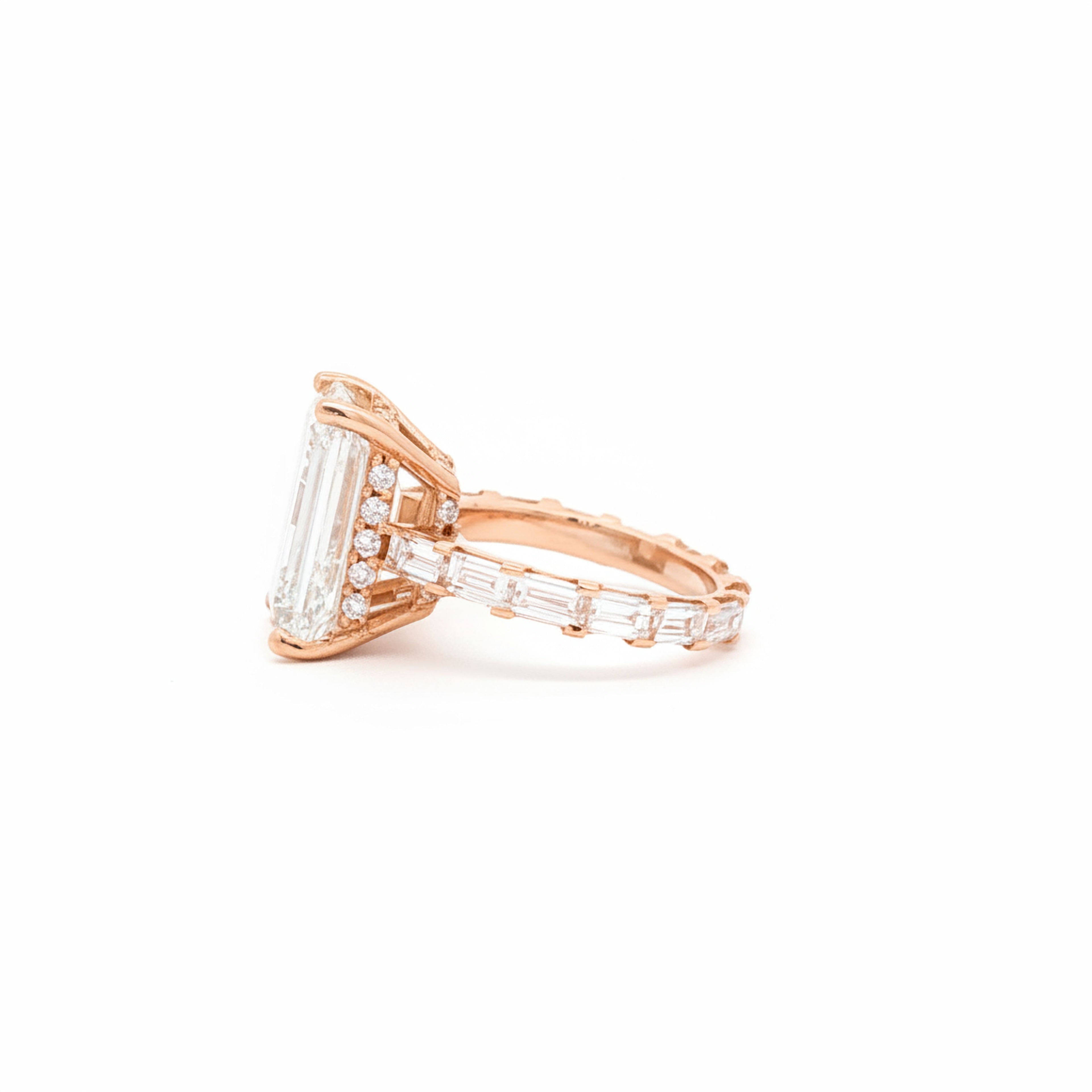 10ct Emerald Ring with Baguette Side Stones