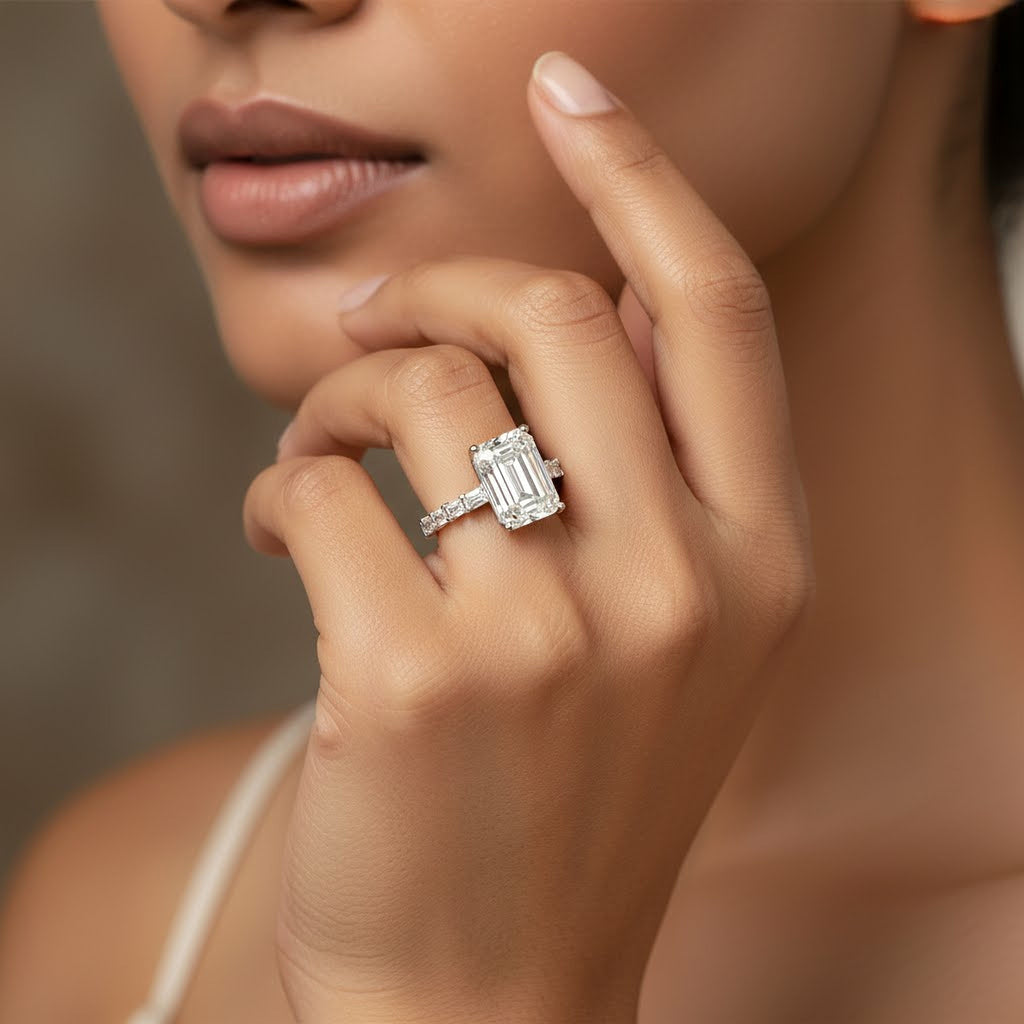 10ct Emerald Ring with Baguette Side Stones