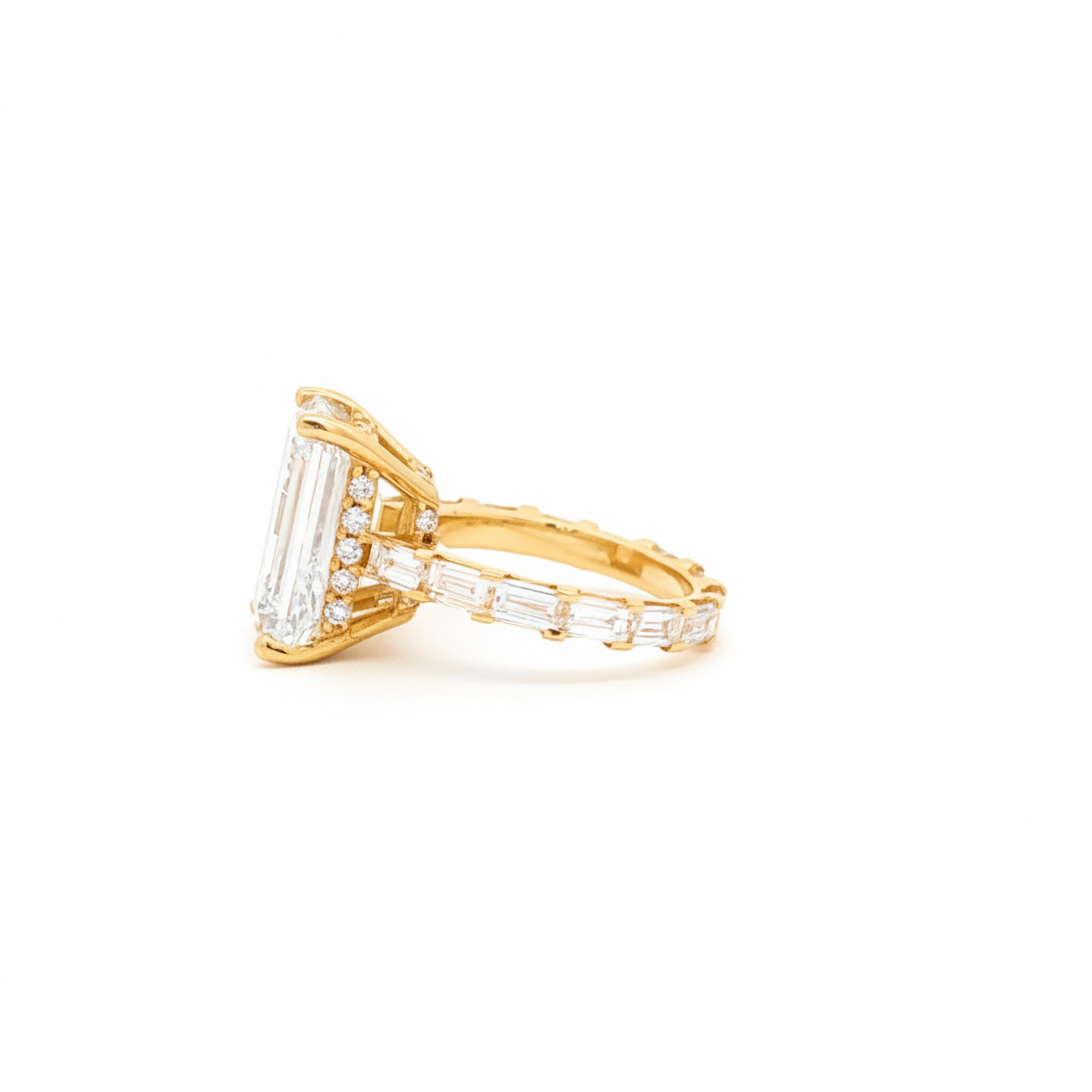 10ct Emerald Ring with Baguette Side Stones