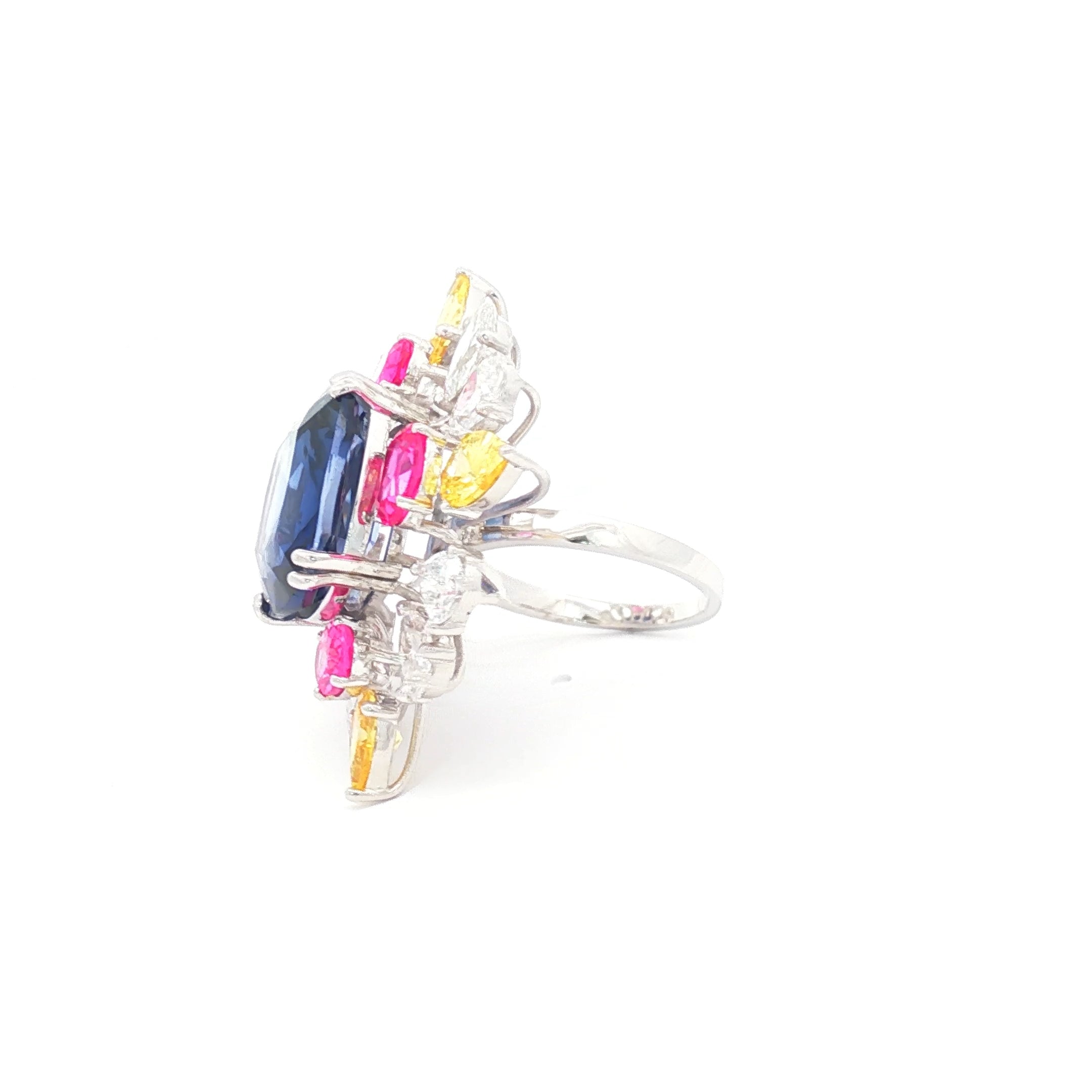 22.56cts Blue Cushion x Pink + Yellow Stones Ring