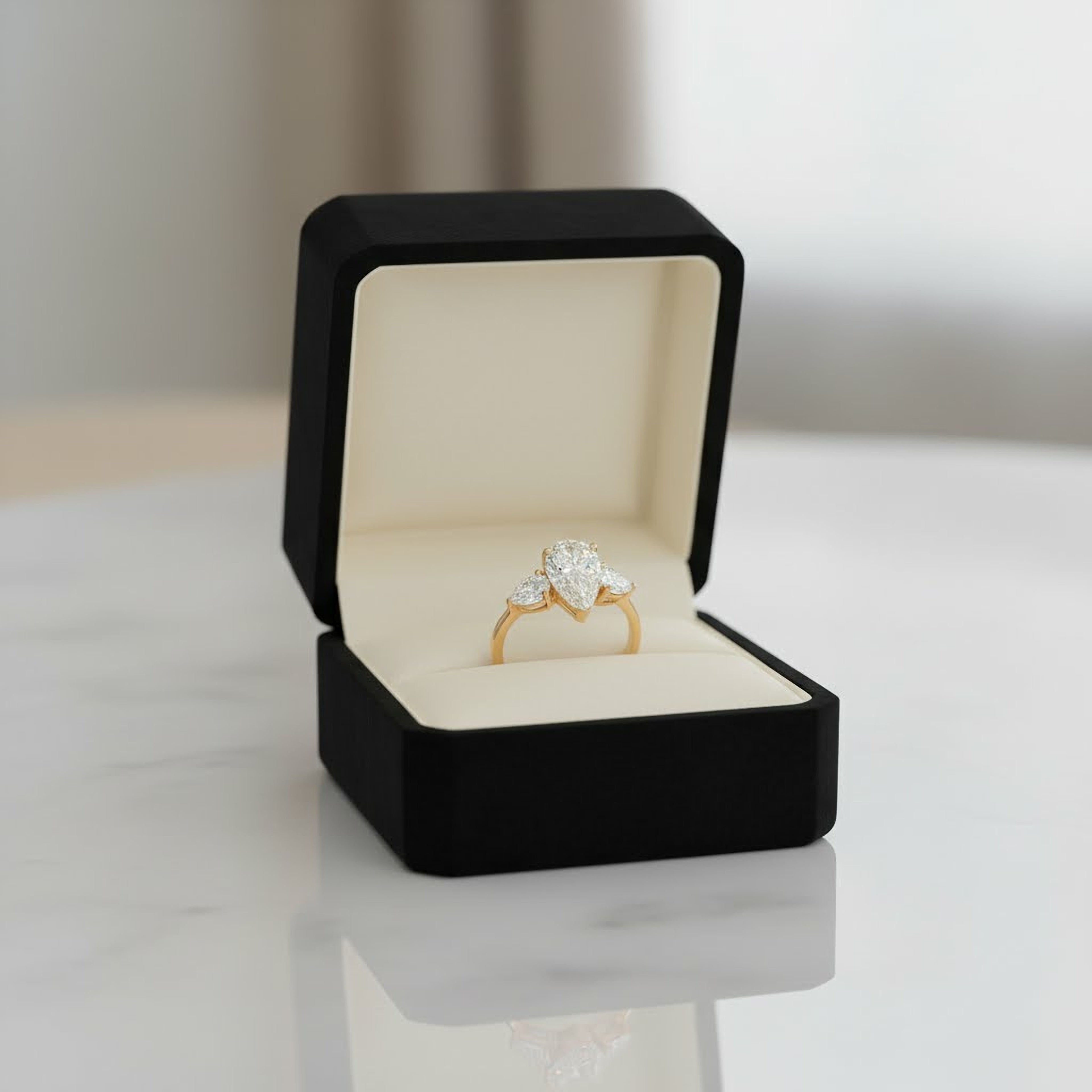 Pear Engagement Ring with Pear Side Stones