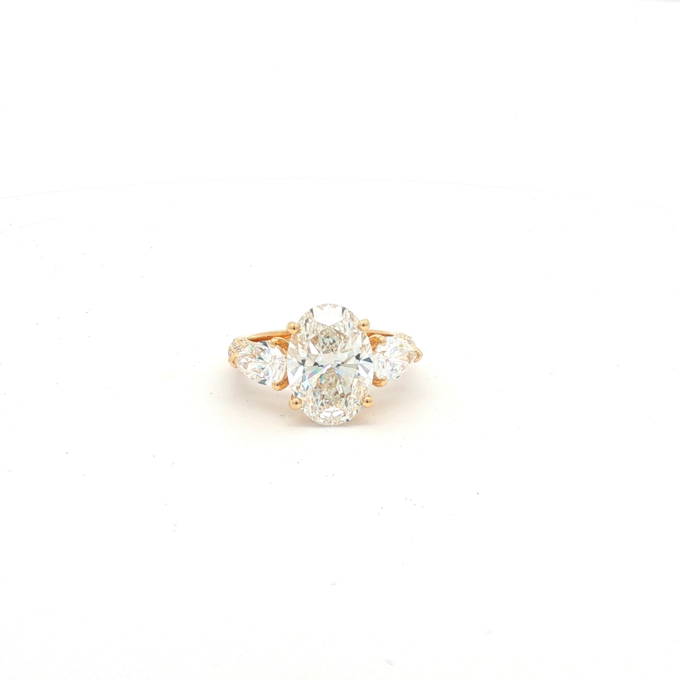 Yellow Gold Oval and Pear Diamond Multistone Ring