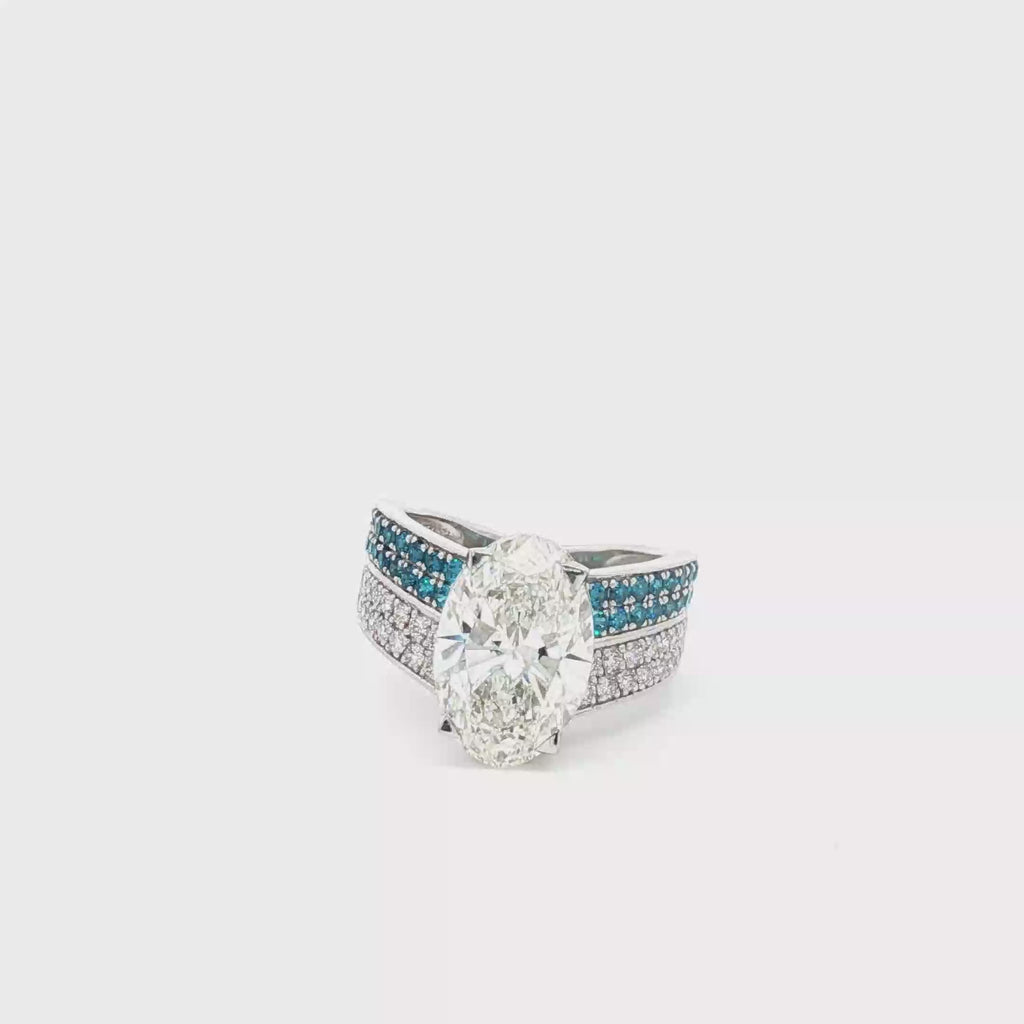 4ct Oval Ring with Blue Stones