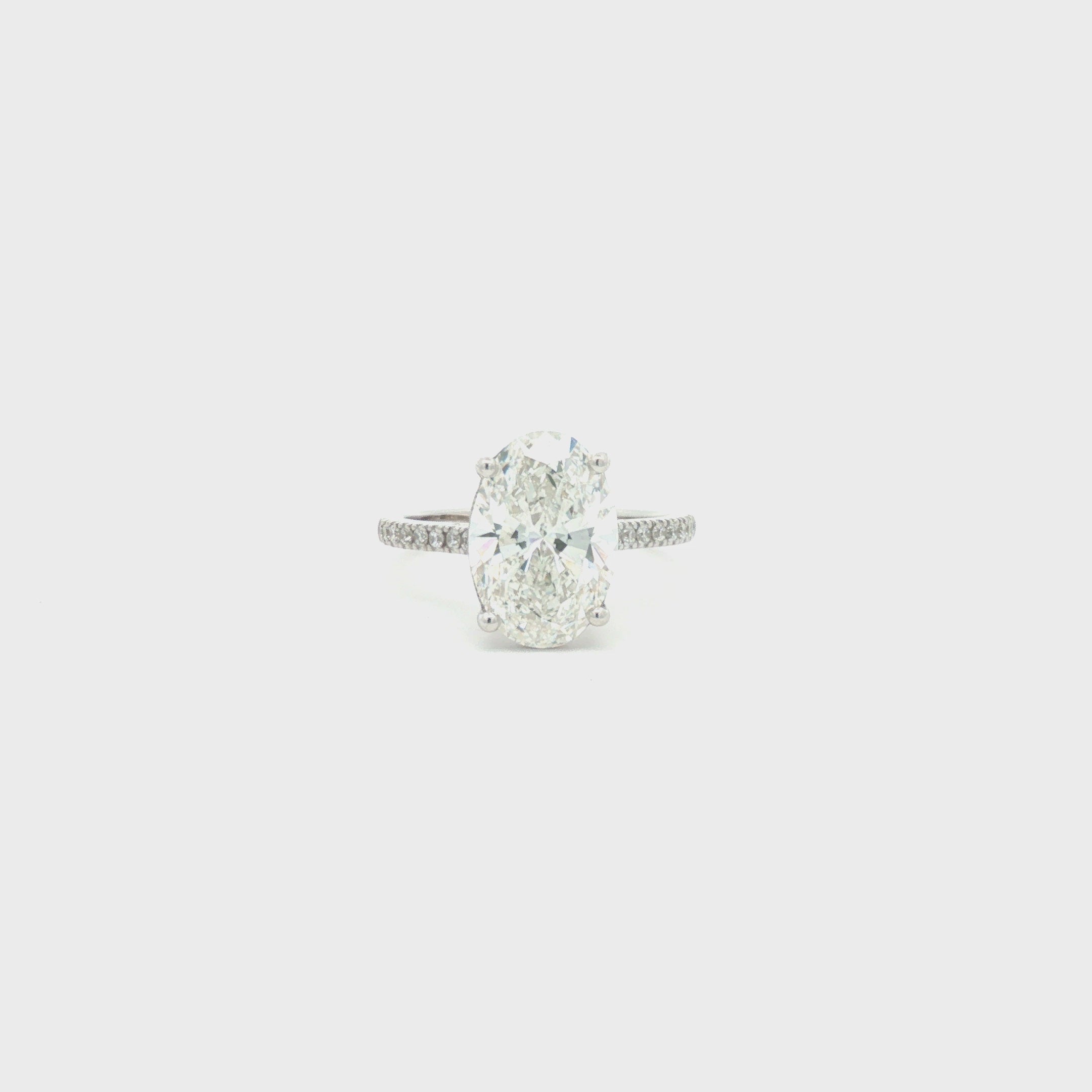Oval Diamond Ring with Pavé Band