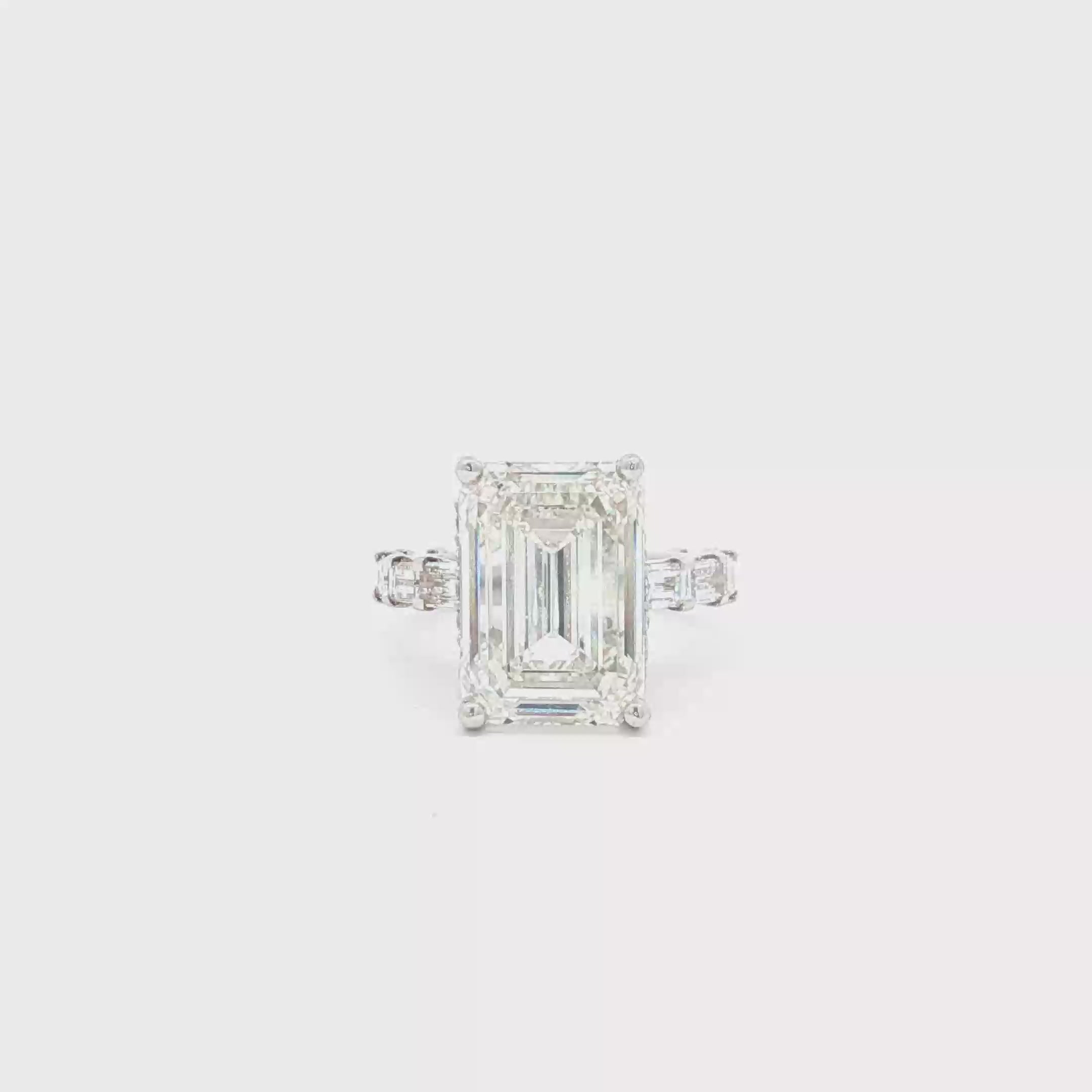 10ct Emerald Ring with Baguette Side Stones