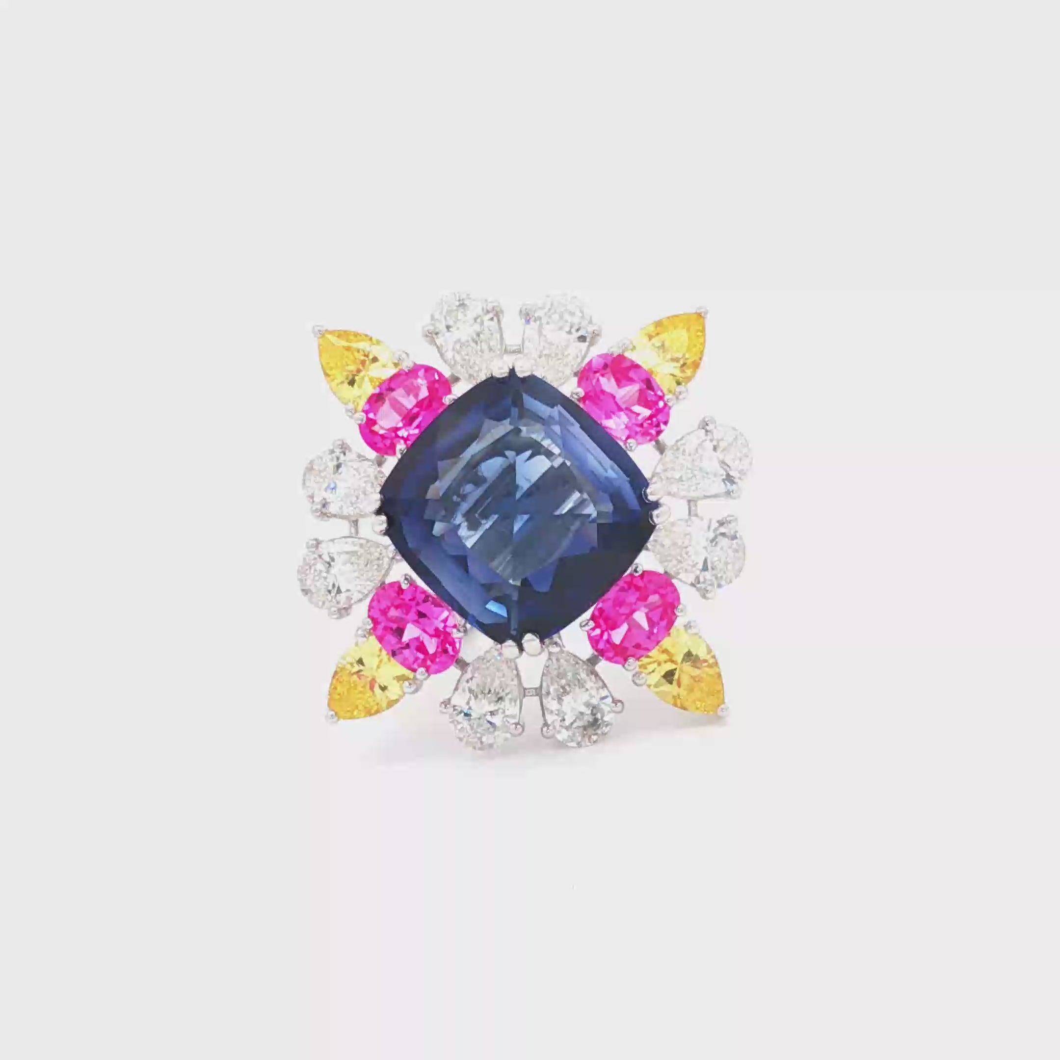 22.56cts Blue Cushion x Pink + Yellow Stones Ring